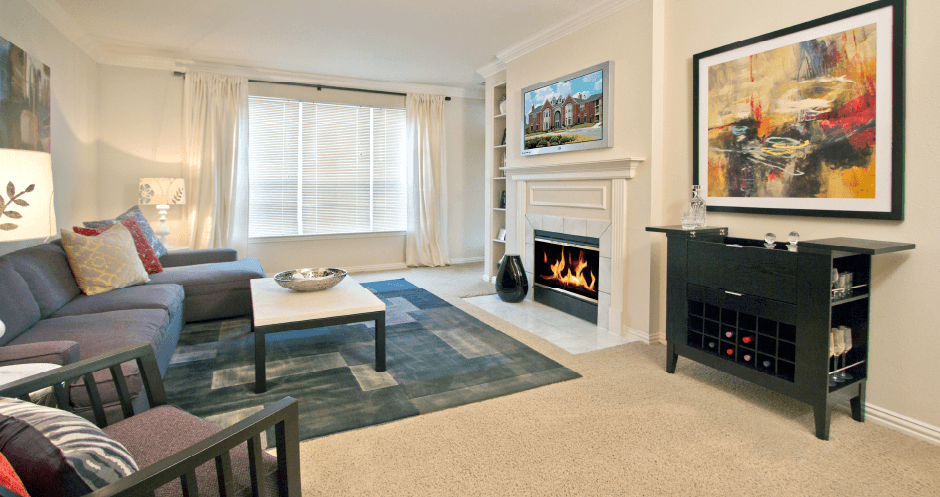 Luxury apartments with spacious layout, spacious floor plan, woodburning fireplace, oversized windows, and built-in shelves at The Biltmore Apartments in Omaha, Nebraska