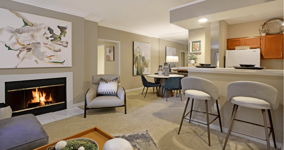 Spacious apartments with oversized windows, wood burning fireplaces, breakfast bar, and built-in shelves at The Dorchester Apartments in north Dallas.