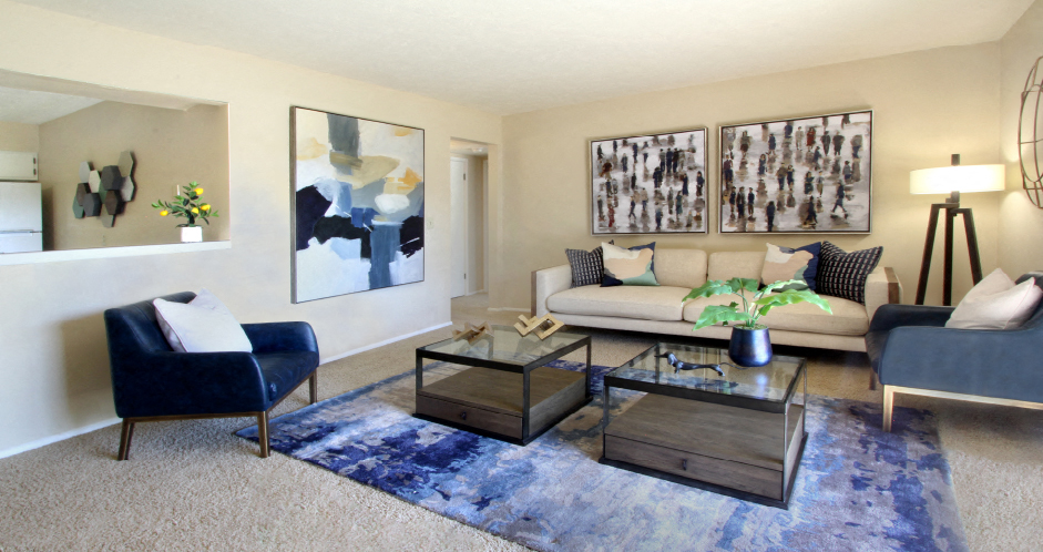 Spacious apartments, spacious living room, huge floor plan, spacious kitchen with white cabinets at Alpine Village Apartments in La Vista, Nebraska