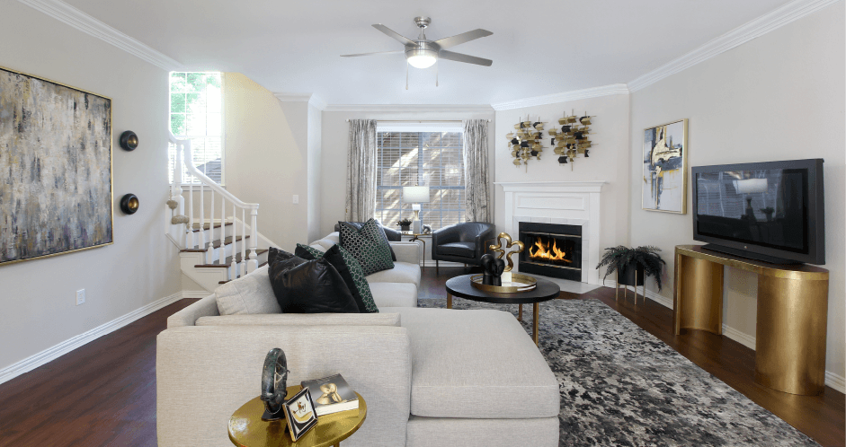 Spacious living room with wood-burning fireplace, huge living room at Tuscany Row Townhomes in Houston.