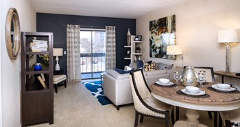 Spacious living room with colored feature wall at Embassy Park Apartments in Omaha, Nebraska - Photo Gallery 29