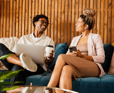 Spacious kitchen with island, granite countertops, custom home cabinets, French doors, smooth glass top stove, spacious pantries, breakfast bar and stainless-steel appliances at Tuscany Row in Houston.