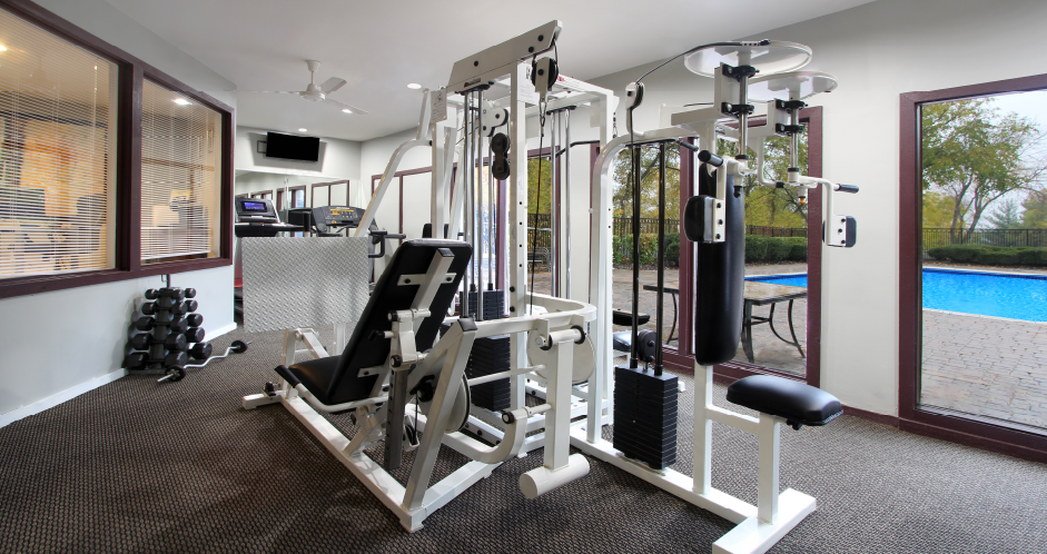 Fitness center and outdoor swimming pool at Inwood Apartments in La Vista, Nebraska