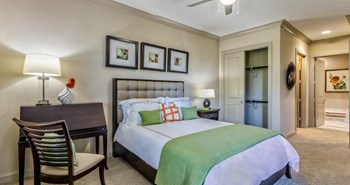 Luxury apartments with master bedroom to fit a king size bed, attached master bathroom and walk-in closet at Villa Piana Apartments in Dallas - Photo Gallery 24