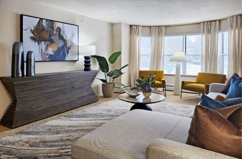 Apartments with spacious floor plans, 9-foot ceilings, and oversized windows with scenic views at Claremont Apartments in Minnetonka Minnesota.