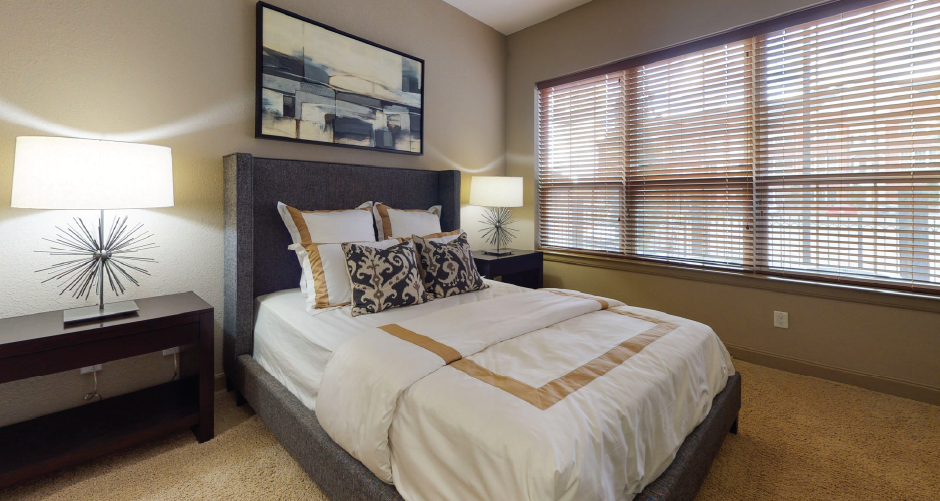 Luxury apartments with master bedroom to fit a king size bed, attached master bathroom and walk-in closet at Bellemeade Apartments in west Des Moines
