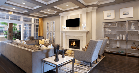 a living room with a fireplace and a couch