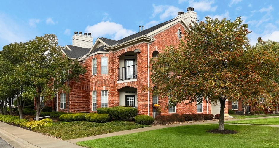 Luxury apartments located at 70th and Pioneers Blvd with red brick exterior and scenic views