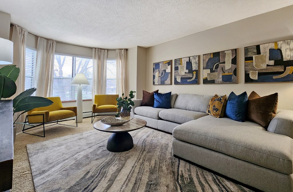 Apartments with spacious floor plans, 9-foot ceilings, and oversized windows with scenic views at Claremont Apartments in Minnetonka Minnesota.