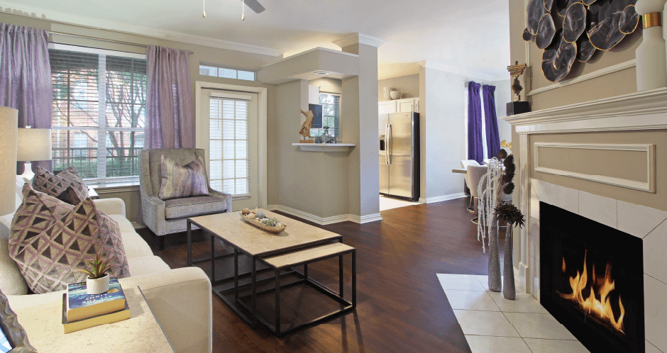 Luxury apartments with wood-burning fireplace, wood plank floors, built-in bookshelves, spacious dining room, and 9-foot ceilings at The Saxony Apartments