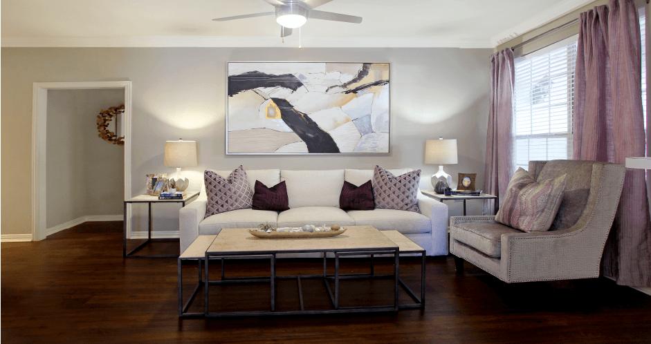 Luxury apartments with wood-burning fireplace, wood plank floors, oversized windows, and 9-foot ceilings at The Saxony Apartments