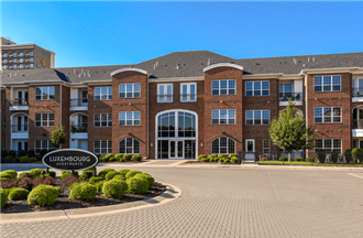 Luxury apartments in Bloomington Minnesota with brick exteriors and attached heated parking