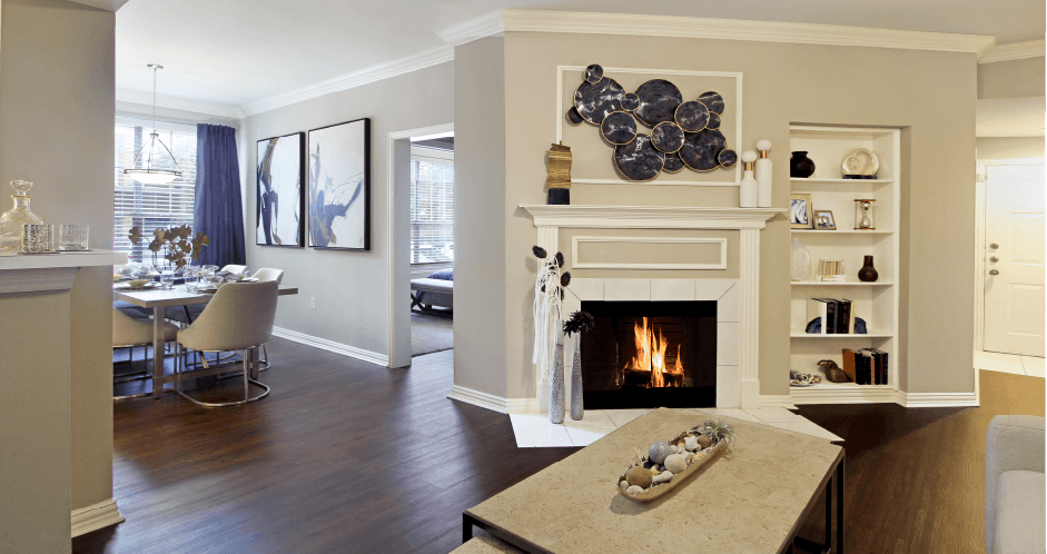 Luxury apartments with wood-burning fireplace, wood plank floors, built-in bookshelves, spacious dining room, and 9-foot ceilings at The Saxony Apartments