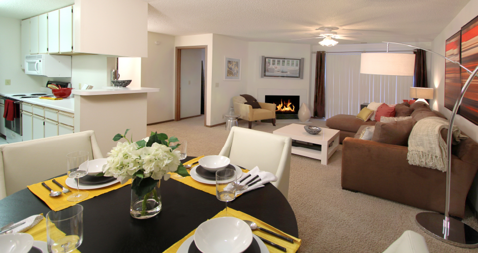 Huge apartment, spacious floor plan, spacious apartment with woodburning fireplace, spacious kitchen, spacious dining room, bright white kitchen at Tanglewood Apartments