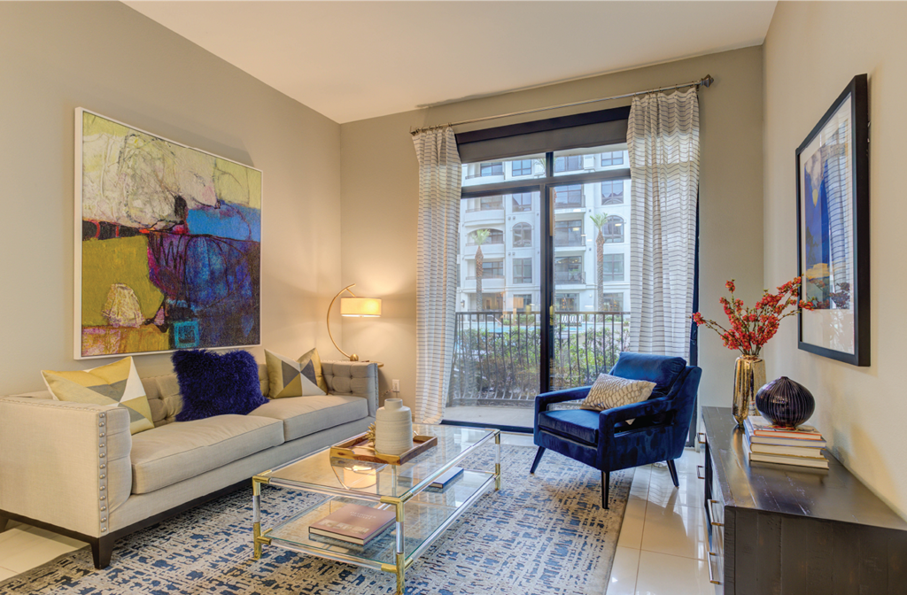 Luxury apartments in River Oaks with spacious living room and 11-foot ceilings at Le Palais Apartments in Houston.