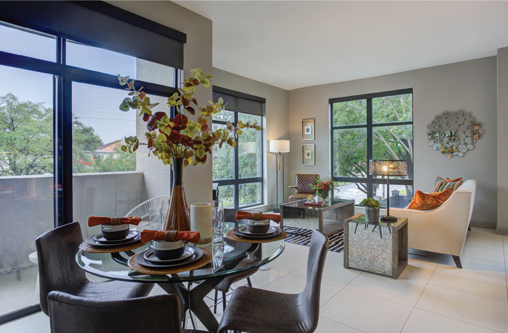 Luxury apartments with spacious open floor plan, oversized windows, and downtown views at Le Palais Apartments in Houston.