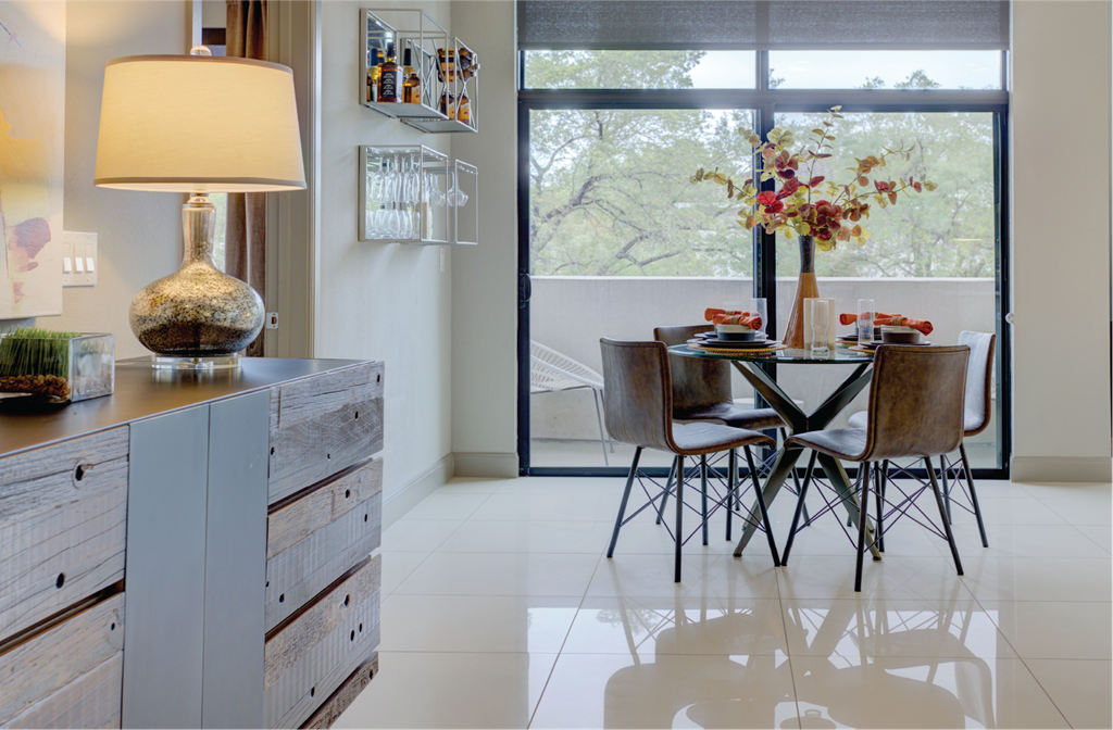 Luxury apartments with spacious open floor plan, oversized windows, and downtown views at Le Palais Apartments in Houston.