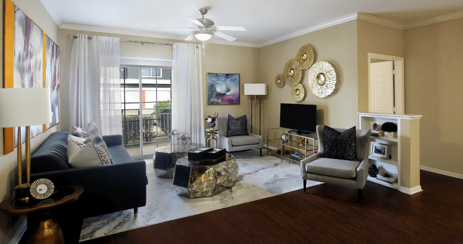 Luxury apartments in North Dallas with spacious floorplans, spacious living room, built-in shelves, 9-foot ceiling, and large balcony at Kensington Square Apartments.