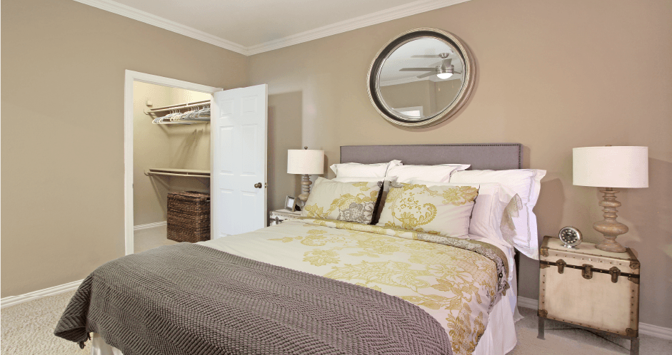 Spacious bedroom with large walk-in closet and 9-foot ceilings at The Biltmore Apartments in Omaha, Nebraska