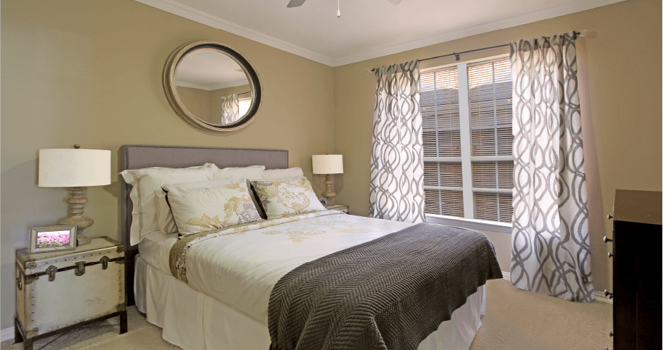 Spacious bedroom with large walk-in closet and 9-foot ceilings at The Biltmore Apartments in Omaha, Nebraska