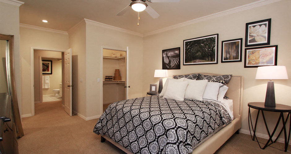 Spacious bedroom with walk-in closet and bathroom at The Biltmore Apartments in Omaha, Nebraska
