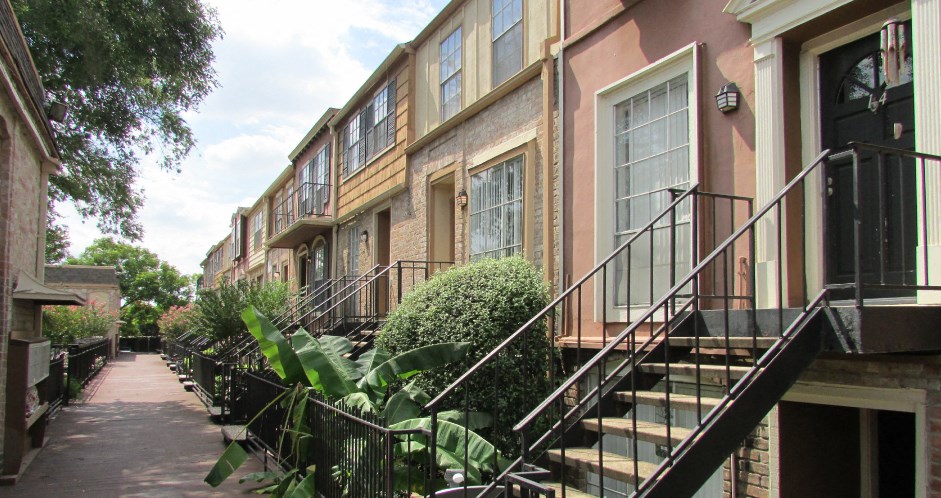 Beautiful unique townhome community near the Galleria within walking distance of shops, restaurants, and entertainment at Briarwood Apartments in Houston.