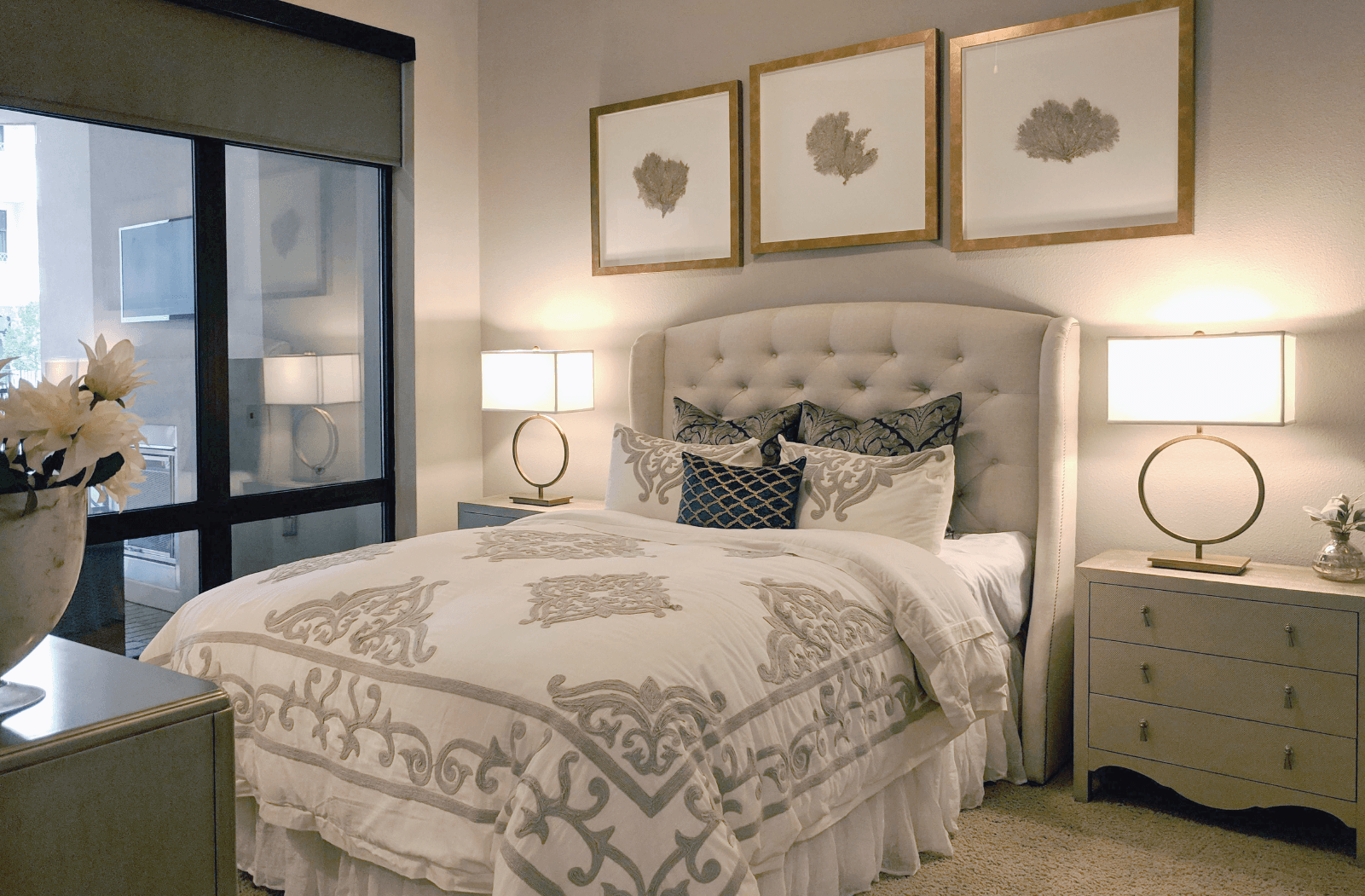 Spacious bedroom with 11-foot ceilings and walk-in closet at Le Palais Apartments in Houston.