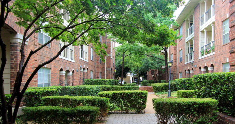Gated apartment community near the Galleria with landscaped courtyards, beautiful landscaping, and beautiful courtyards with fountains.