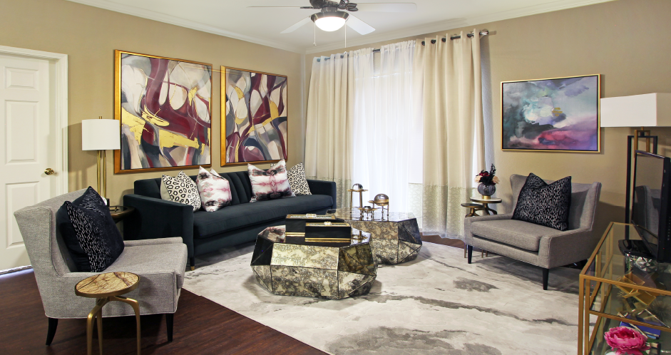 Luxury apartments in North Dallas with spacious floorplans, spacious living room, built-in shelves and large balcony at Kensington Square Apartments.