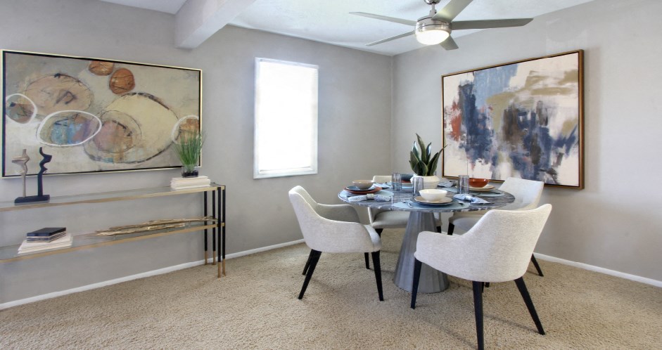 Spacious dining room with gray wall color at Inwood Apartments in La Vista, Nebraska