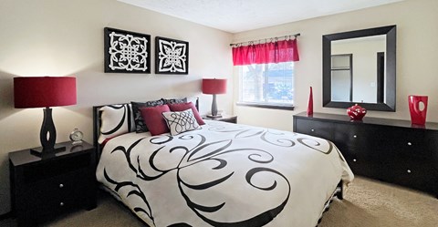 Spacious bedroom with walk-in closet at Kensington Woods Apartments