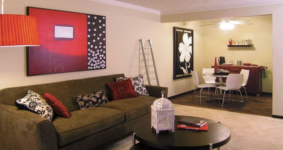 a living room with a couch and a table