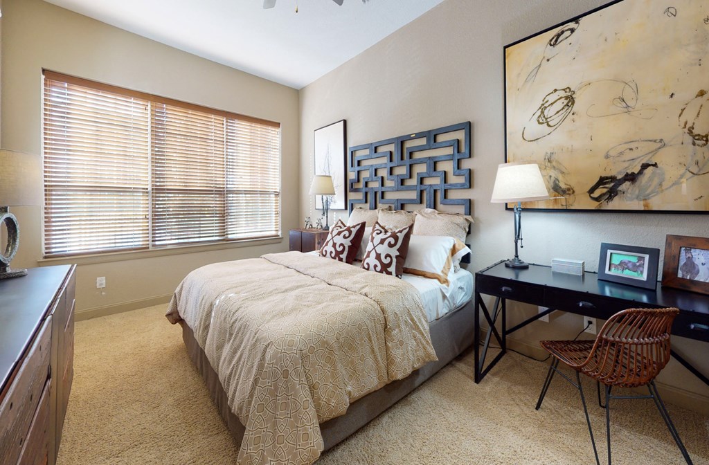 Luxury apartments with master bedroom to fit a king size bed, attached master bathroom and walk-in closet at Luxembourg Apartments in Bloomington Minnesota