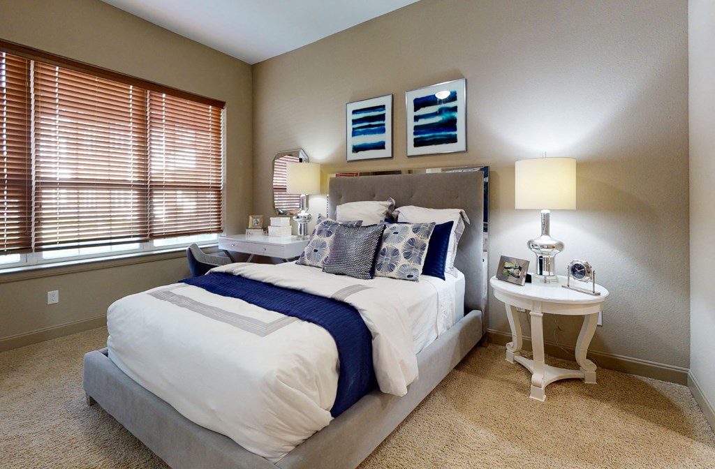 Luxury apartments with master bedroom to fit a king size bed, attached master bathroom and walk-in closet at Luxembourg Apartments in Bloomington Minnesota