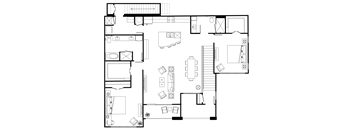 A black and white floor plan of a house with various rooms and furniture.