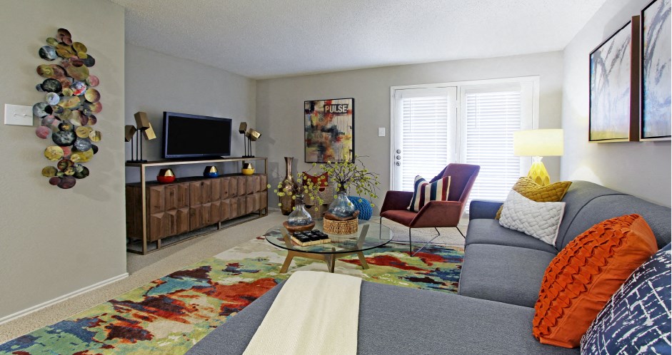 Spacious apartment with French door at Preston Village Apartments in North Dallas