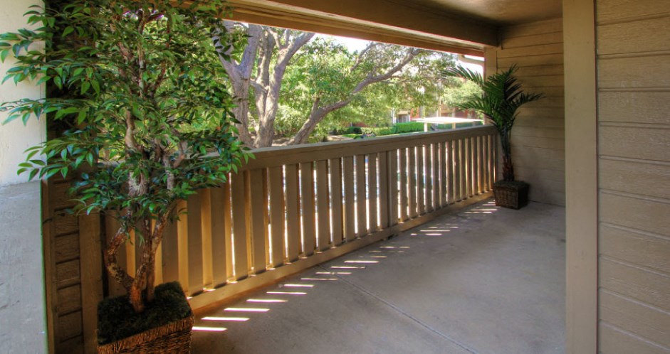 Spacious balcony with scenic view at Preston Village Apartments in North Dallas