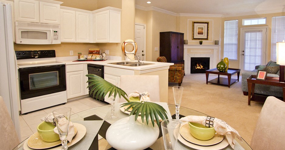 Luxury apartments in south Lincoln Nebraska with bright white kitchens, French doors, and gas fireplaces