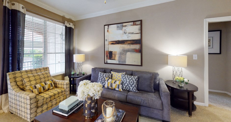 a living room with a couch and a coffee table