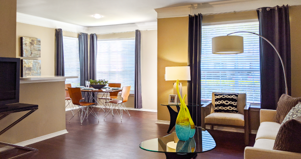 Spacious apartments with wood plank floors, 9-foot ceilings, and oversized windows near the energy corridor in Houston.
