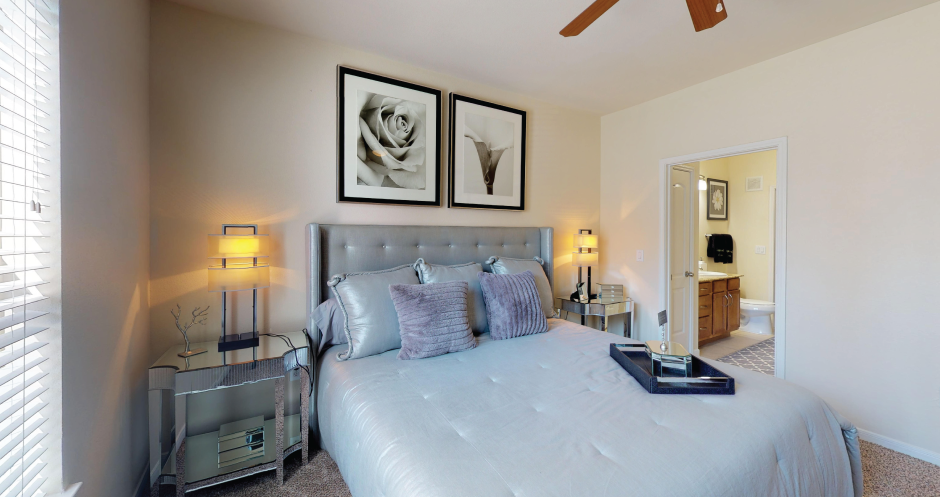 Luxury apartments with large master bedrooms to accommodate king-size beds, attached master bathroom and walk-in closet at The Voss Apartments in Houston.