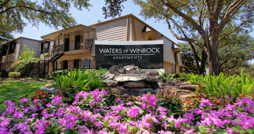 Gated apartment community close to the Galleria with pool, spa, poolside lounge chairs, lush landscaping, beautiful landscaping, and neighborhood setting.