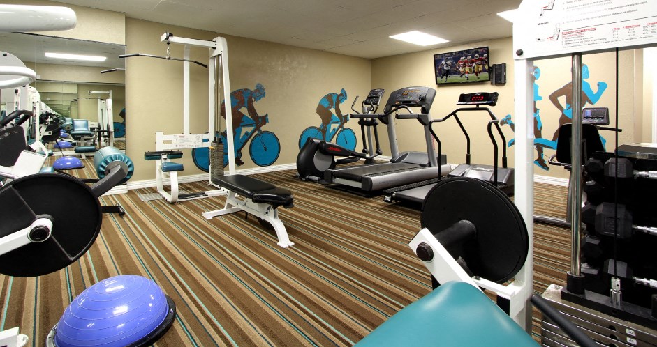 Fitness center at Woodlake Oaks Apartments in Houston, Texas