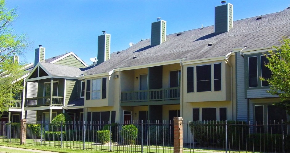 Gated apartment community with 4 swimming pools, convenient bayou location only minutes away from shopping and dining and scenic views at Woodlake on the Bayou Apartments in Houston.
