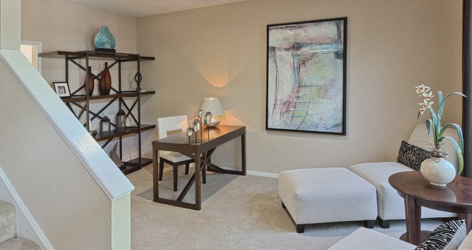 Spacious den or office area with 9-foot ceilings at Woodlake on the Bayou Apartments in Houston.