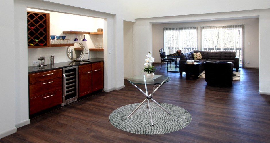 a living room with a table and a couch