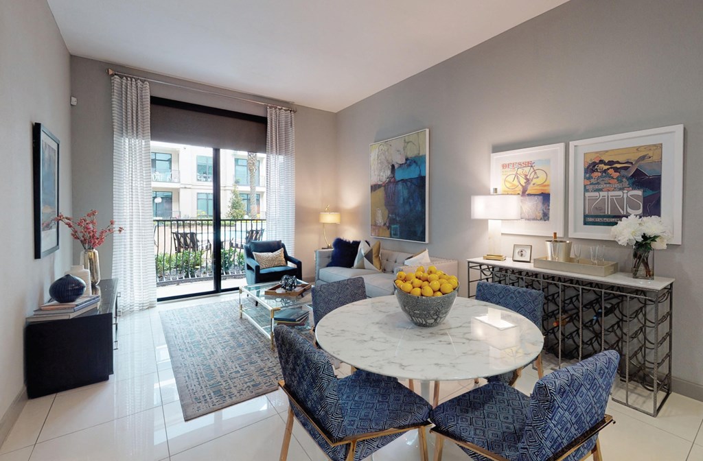 Luxury apartments in River Oaks with spacious living room and 11-foot ceilings at Le Palais Apartments in Houston.
