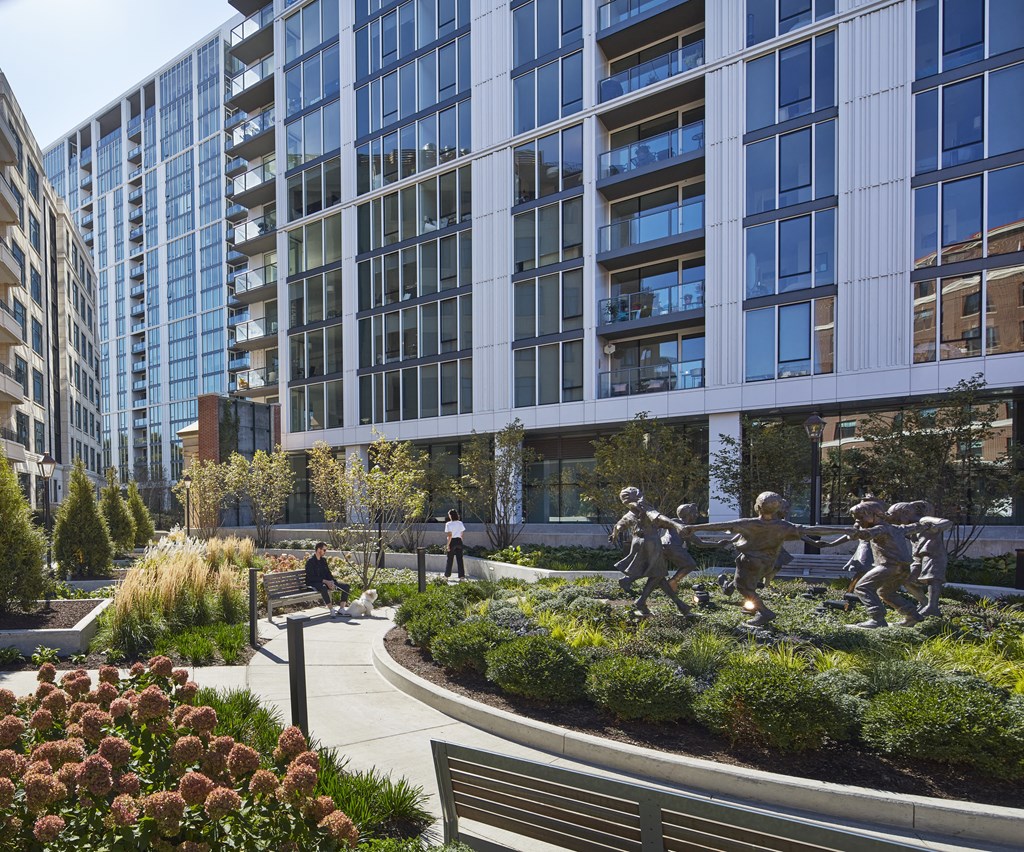 6-acre site with walkways and a playground at The Apartments at Lincoln Common, Illinois