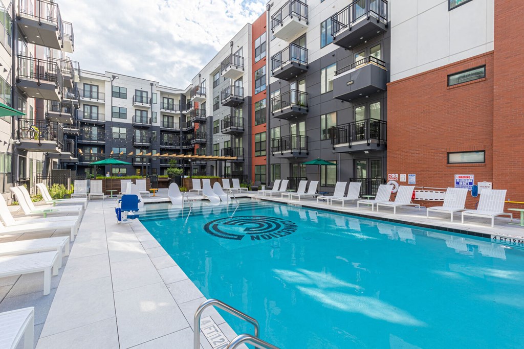 our apartments have a large pool and lounge chairs