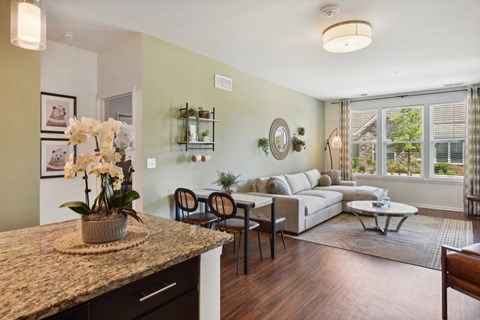 a living room with a couch and a table